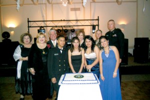 NJROTC CADETS AND SBCISD OFFICIALS CUT THE CEREMONIAL CAKE