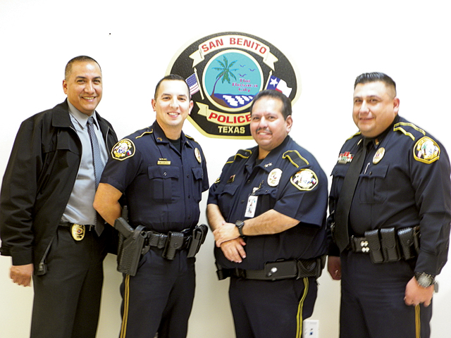 San Benito Police Department officers Isaac Vasquez and Mike Cortez are seen during the ceremony recognizing their promotion to lieutenant and sergeant, respectively. Also shown are SBPD Assistant Operations Chief Michael Galvan and Operations Chief Martin Morales. (Staff photos by Heather Cathleen Cox)