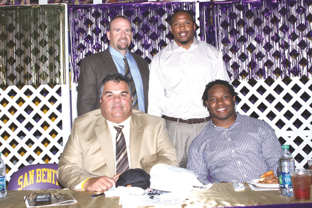 Attending the 2012-2013 San Benito Greyhound Quarterback Club Football Banquet were Jacksonville Jaguars running back Maurice Jones-Drew and NFL free agent Chris Horton. Jones-Drew (seated) and Horton are shown with San Benito Greyhound Head Football Coach Spencer Gantt (standing) and Defensive Coordinator Dave Evans (seated). Also, players shown were awarded with annual distinctions. Linebacker Rene Chavez won Football MVP. (Photos by T.J. Tijerina)