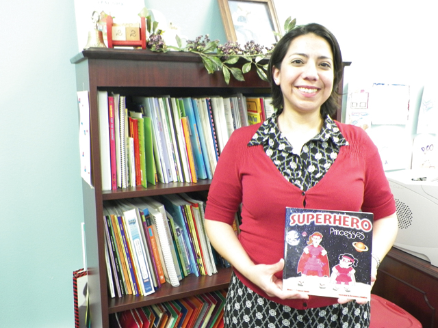 Local author Venessa Zepeda is seen Thursday at La Encantada Elementary School, where she works as a counselor. Zepeda discussed her debut work as an author, Superhero Princess. (Staff photo by Francisco E. Jimenez)