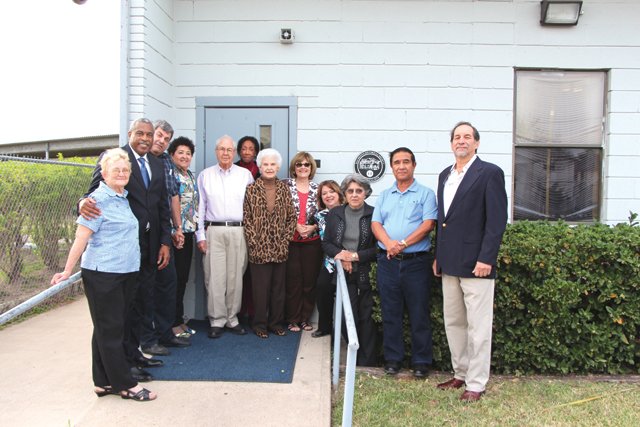 Members of the San Benito Historical Society are seen at the Joe Callandret Positive Redirection Center on Tuesday during an unveiling ceremony. In recognition of the 60th anniversary of the Joe Callandret School and in commemoration of Black History Month, the historical society unveiled its 11th historical marker dedicated to the school. Shown (from l-r) at the ceremony are Truella Haynes, George McShan, Jack Ayoub, Janie Silva, Dick Welch, Velvet Hutcherson, Marianne Welch, Tootie Madden, Sandra Tumberlinson, Mila Salinas, Rey Avila and Zeke Luna. (Courtesy photo)