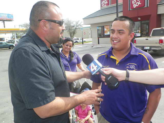 Lucio Garcia (left) is seen Thursday surprising his friend Noe Zavala with a visit from KGBT Channel 4, which recognized Zavala in this week's Pay It 4ward for his work raising money for the family of Ruby Ramirez, the 7-year-old girl who died earlier this year after reportedly choking on a balloon. (Staff photo by Francisco E. Jimenez)