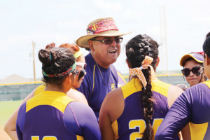 San Benito Lady ’Hounds skipper Elias Martinez is seen speaking to his team during Saturday’s Region IV Semifinal game against Smithson Valley in Laredo. (KSBG TV photo by Isabel Alicia Gomez)