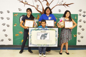 Participants of the 2013 Texas Department of State Health Services Zoonosis Rabies Awareness and Prevention Poster Contest include runner-up Layla Garcia, winner Ryan Salazar, Cameron County Department of Health and Human Services Social Services Director Patricia D. Sanchez and runner-up Iliana Garcia. Not shown is runner-up Jose Barrientos. (Courtesy photo)