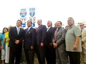 San Benito News photo by Francisco E. Jimenez Local and state dignitaries--including State Sen. Eddie Lucio Jr., Mayor Chris Boswell and City Commissioner Basilio “Chino” Sanchez of Harlingen, Brownsville Mayor Tony Martinez and San Benito Mayor Joe H. Hernandez--are seen Monday at the unveiling of the Interstate 69 (I-69) signs in Harlingen.