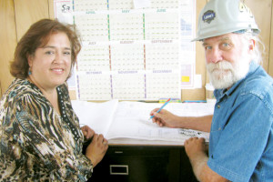Photo by Christina R. Garza Mari Galvan of San Benito is seen on Monday with Charley Medley, a general contractor with Colair Construction, at the construction site of the new Port Isabel Events Center. Galvan began work as the center’s coordinator on July 15.