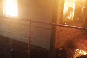 Video still A video still taken from footage shot by San Benito resident Hector Avila shows a house fire that occurred next to his Franklin Street home Sunday.