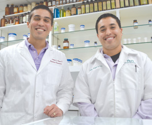 (Staff photo by Francisco E. Jimenez) Shown are childhood friends (from left to right) Leo Ramirez and Rudy Rangel, who are now pharmacists and coworkers at Fry’s Pharmacy in San Benito.