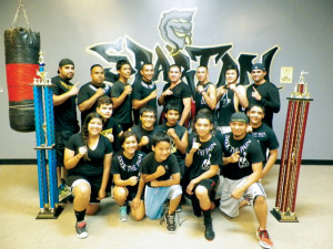 (Staff photo by Heather Cathleen Cox) Seen are members of Abel Fonseca’s Spartan Boxing Academy in Harlingen, some of whom won first place at a recent competition. Fonseca also started Soccer House inside the same facility.