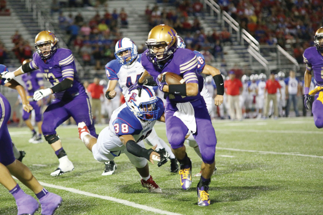 (Photo by T.J. Tijerina) Running back Gabriel Vasquez put on a clinic for the San Benito Greyhounds on Friday, rushing for four touchdowns against the Edinburg Bobcats en route to a 53-7 shellacking.
