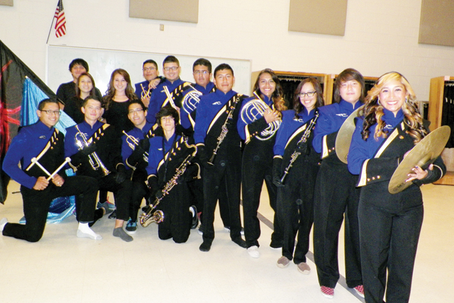 (Photo by Angelica Chavez) Senior members of the San Benito High School Marching Band are shown at the band hall during picture day on Friday.