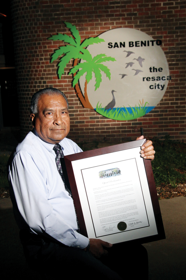 (Photo by T.J. Tijerina) Assistant City Manager Hector “Chuck” Jalomo is seen outside San Benito City Hall with a proclamation from the San Benito City Commission recognizing his 47 years of employment.