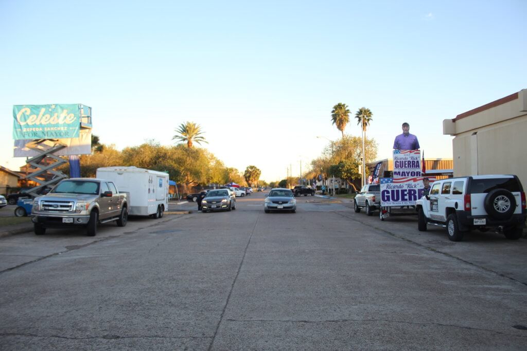 Photo of street with campaigners on each side